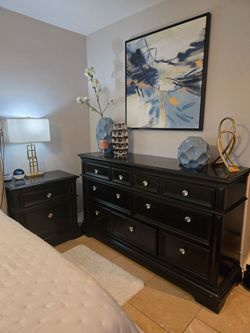 Living Spaces Pulaski Dresser and two Nightstands.