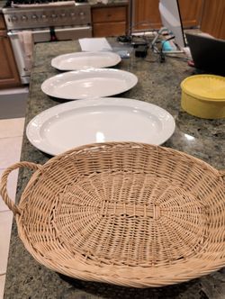 Serving Platters And Wicker Basket.
