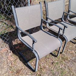 FOUR NICE MATCHING METAL PATIO CHAIRS 