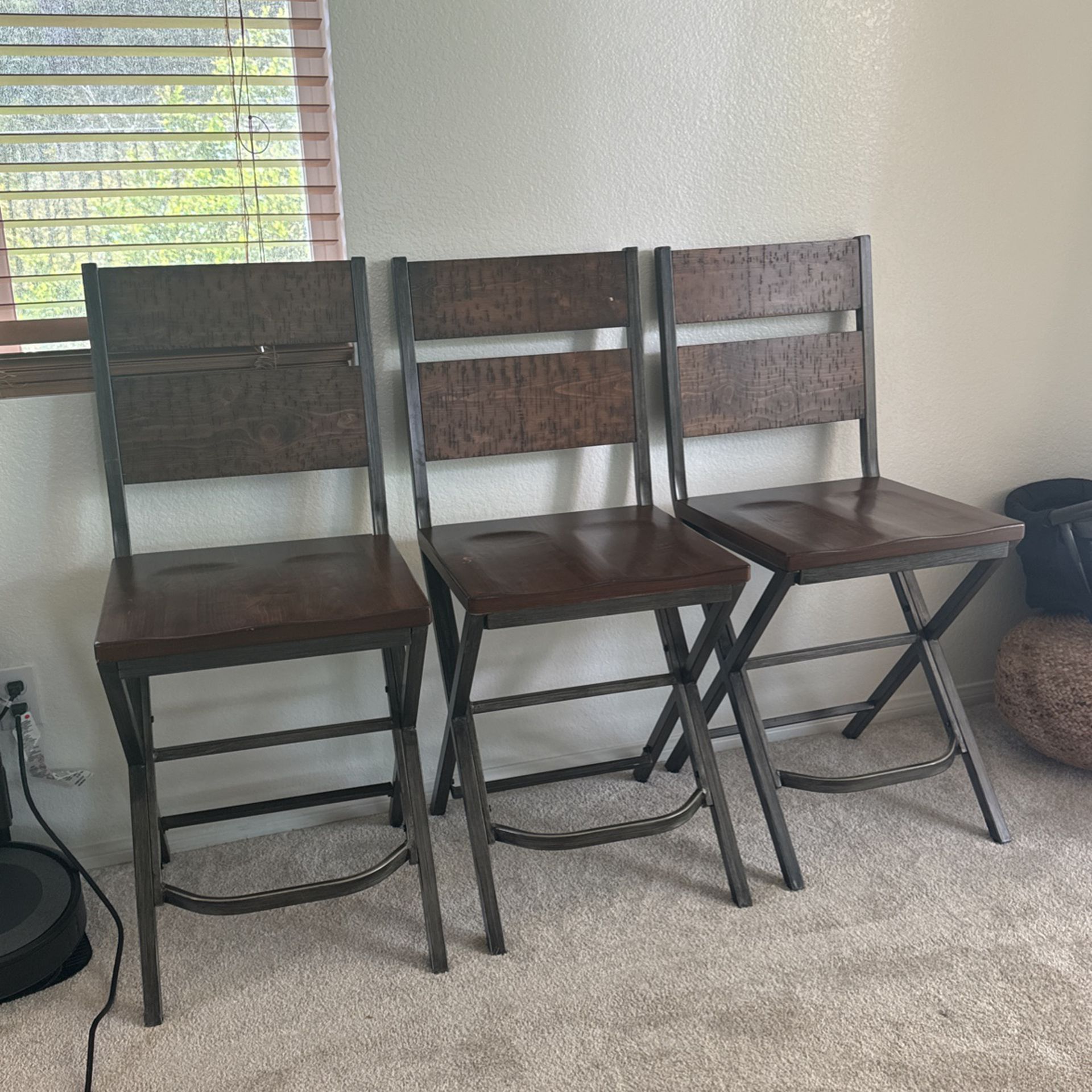 Set Of 4 Wooden Chairs From Ashley furniture 