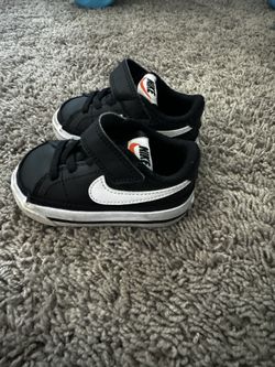 Low Top Baby Nikes Size 4