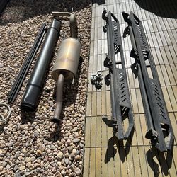 Tacoma trd off road topper, exhaust, and running boards