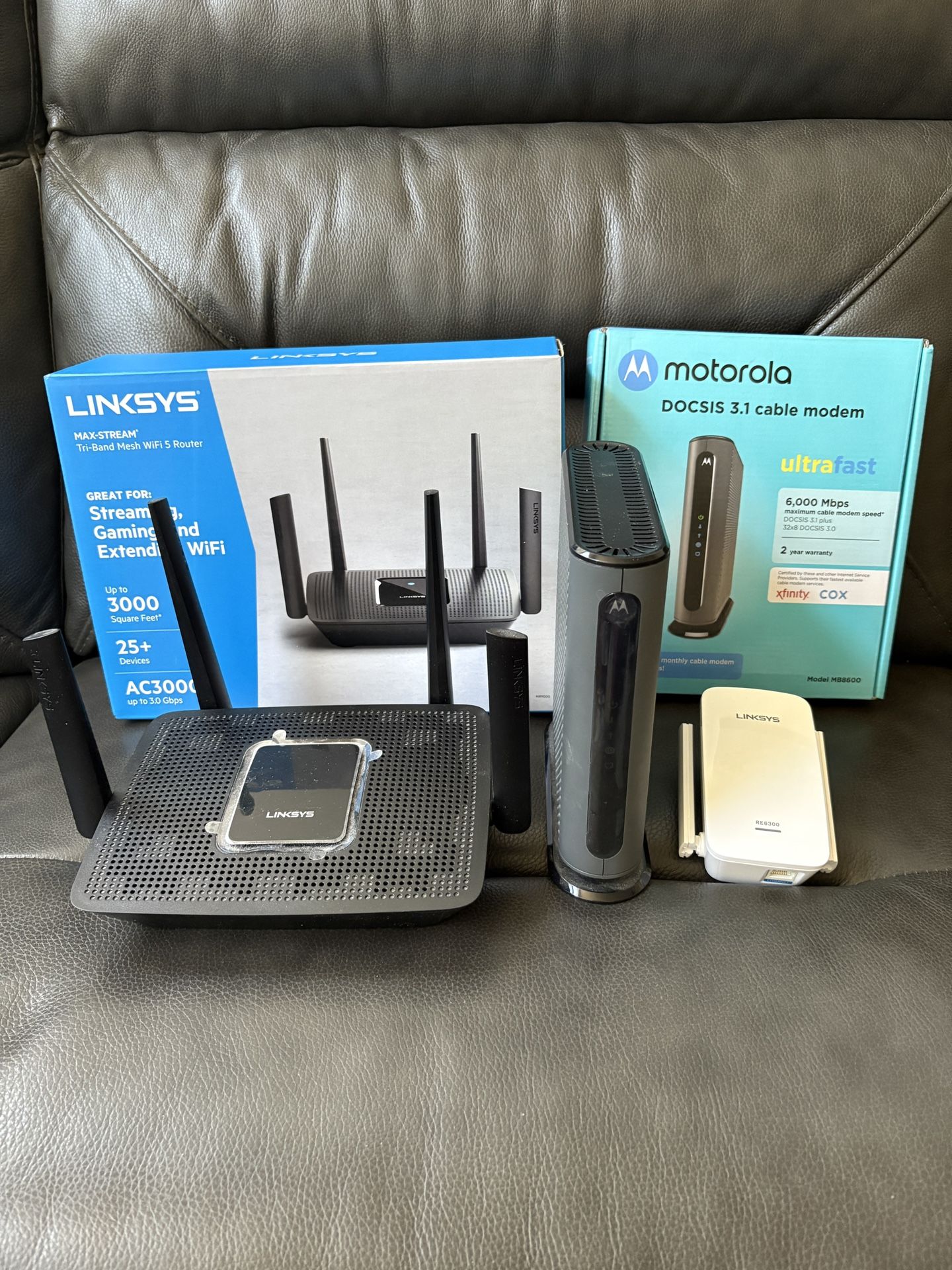Motorola Cable Modem + LinkSys Wireless Router + LinkSys Extender