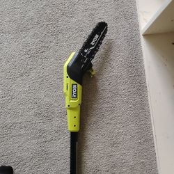 Ryobi Chainsaw On Stick  18v 1 Battery Plus Charger . Used Twice 