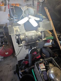 Bench grinder with stand and extra wire wheel and Stone