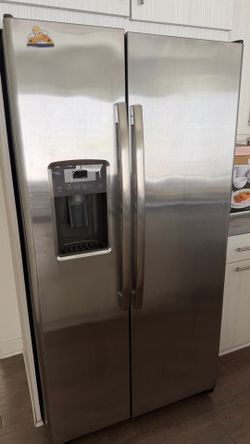 Like new GE 22 Cu. Ft. Side-by-Side Counter-Depth Refrigerator (Stainless Steel)