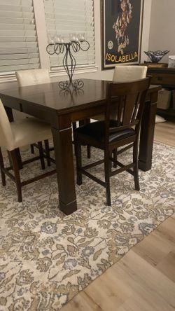 Leaf Dining Table Comes With 6 Brown Chairs