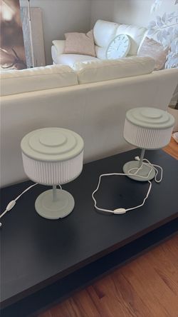 Coffee table, lamp, and pictures