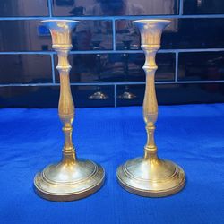 Beautiful vintage solid brass candlesticks with sculptured body