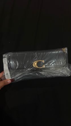 coach jet shoulder bag in black gold