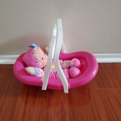 Baby toy carrier with baby