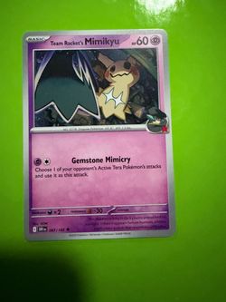 Team Rocket's Mimikyu Pokémon Card 087/182