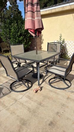 Well loved table and 4 chairs