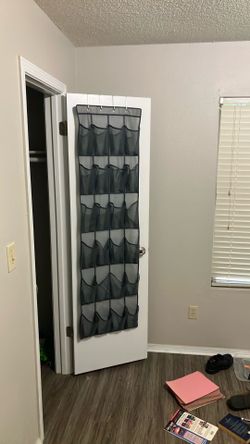 Over-the-door pocket organizer