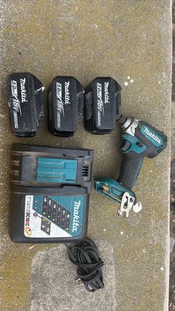 Makita LxT brushless impact drill charger an 3 batteries