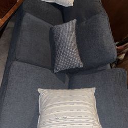 Couch and ottoman And 3 Pillows like new . Easy Garage pick up