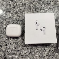 Apple AirPods (3rd generation) with a charging case