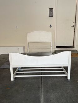White metal girls bed