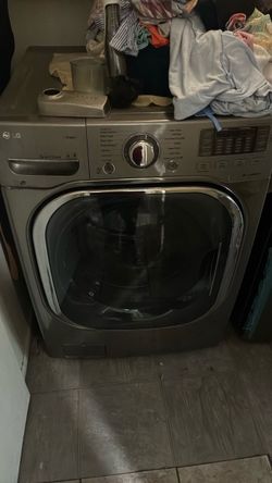 LG Front Load Washing Machine Steam Direct Drive. And Samsung electric dryer.