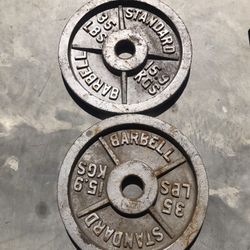 2-35lbs Olympic Style Weights 2inches.  