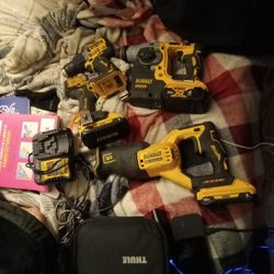 1 Dewalt Sawzall 1 Hammer Drill And One Drill Driver And 1impact Drill.