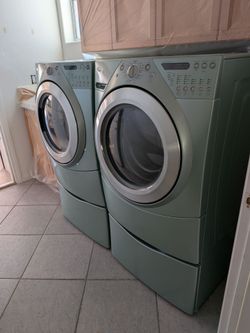 Whirlpool Front Loading Duet Steam Washer and Dryer with Matching Pedestals