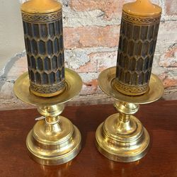 Mid century brass candleholders include candles