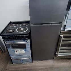 Stove And Fridge Side 20 New Open Box Warranty  Ready To Deliver $700 Both Item Warranty