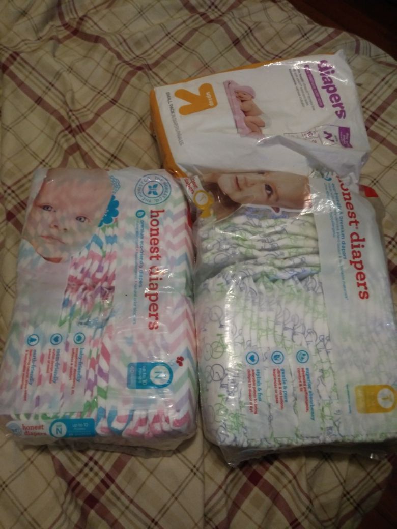 NEWBORN BABY DIAPERS ASKING $20 OR BEST OFFER..