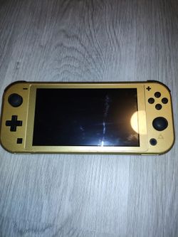 Nintendo switch lite hyrule edition gold