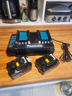 Makita Dual Charger + Pair of 4ah Batteries