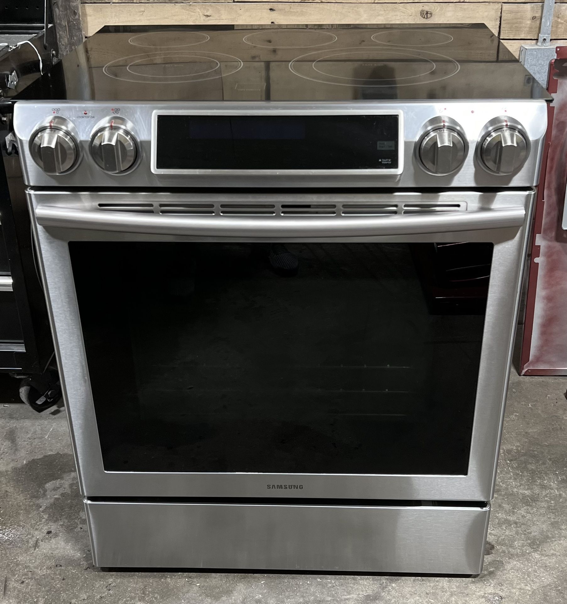 5.8 cu. ft. Slide-in Electric Range with Dual Convection in Black Stainless  Steel Range - NE58K9500SG/AA