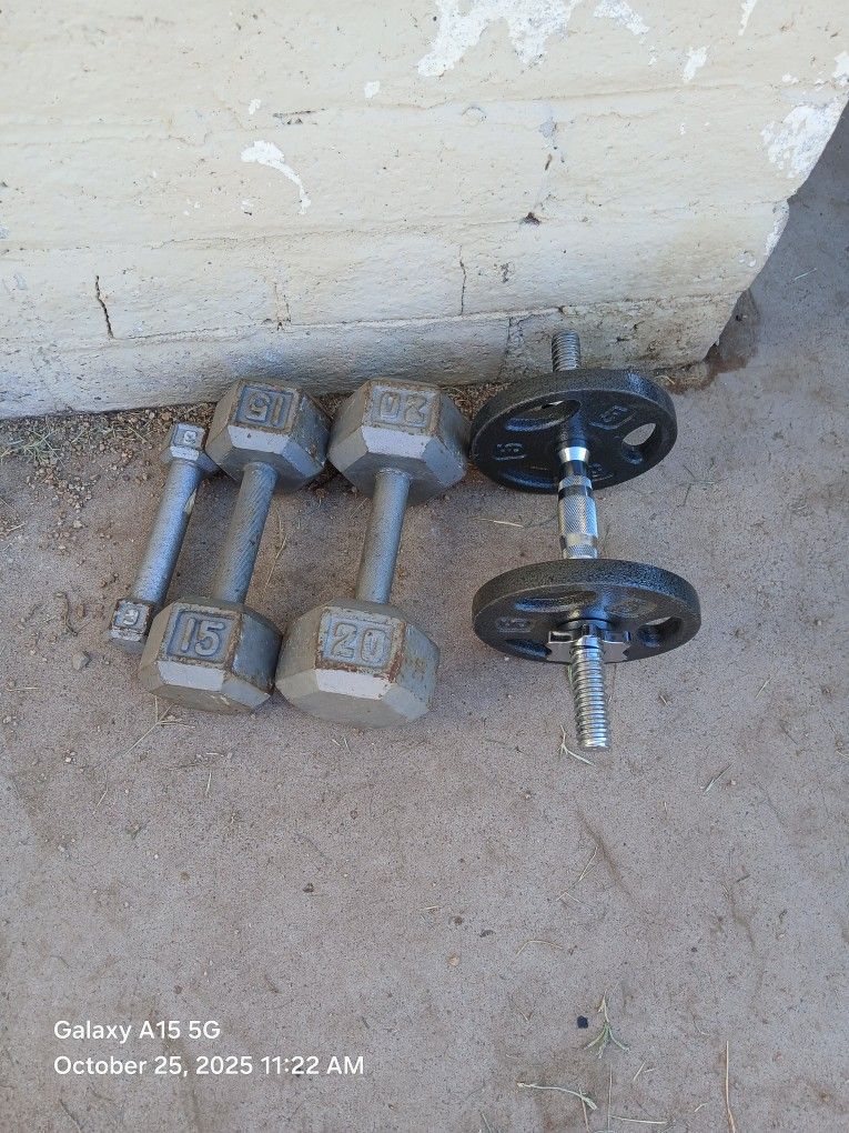 (1) 20 Lb. Dumbbell (1) 15 Lb. Dumbbell (1) 3 Lb. Dumbbell  (1) Adjustable Dumbbell All For $40 Firm!
