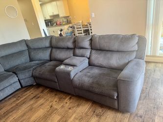 Sala esquinera con tres reclinable