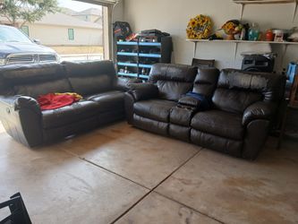 Brown leather Reclanercouches