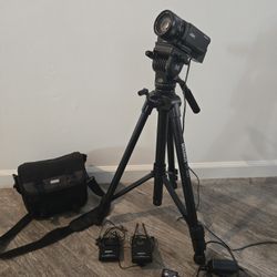 Sony FDR-AX100 4K Video Recorder, Tripod, Lavalier Mic