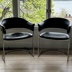 2 modern black leather chairs 