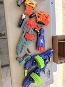 7 nerf guns, 800 bullets, masks and eyewear. Camo mesh for decoration