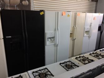 Side-by-side refrigerators everything work on them 30 days warranty