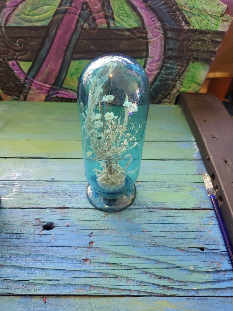 Bottle With Dried Plants Inside 