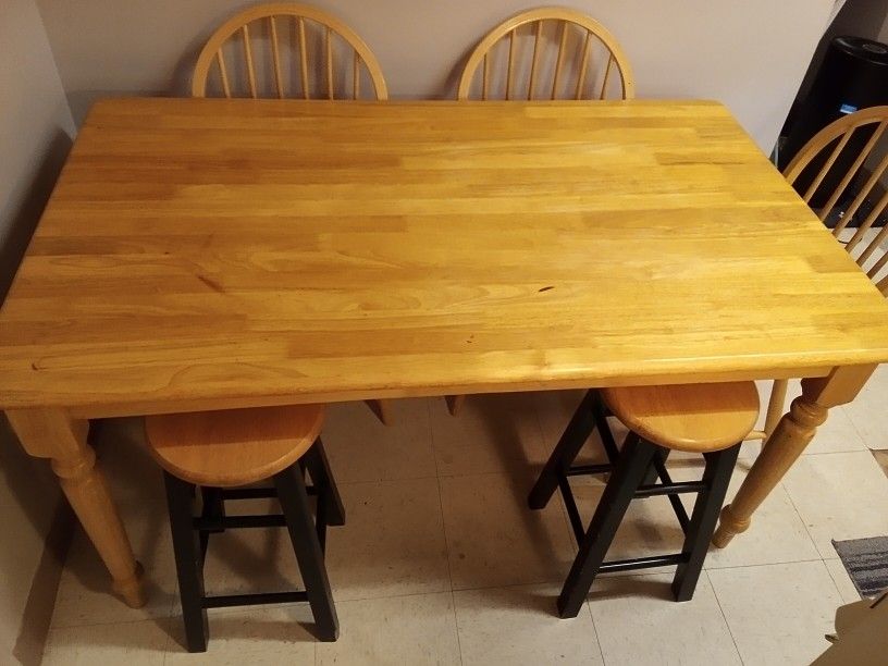 Wooden Table With Three Chairs And Two Stools 