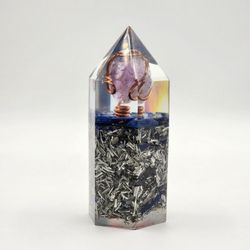 Ascend Hexagon Orgonite Tower: Ultimate EMF and 5G Protection

Weighs 14.2 oz 
Width 2-3/8 in. 
Height 5-1/2 in. 

Material:
Amethyst, Lapis, Dumortie