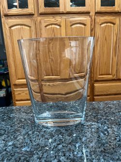 Heavy Glass Vase.  Size 9 1/2 inches tall.  Brand new never used.  Has been on display in a cabinet.