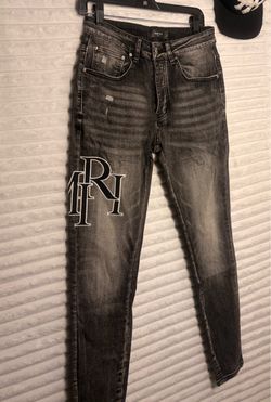 Amiri Staggered Logo Jeans