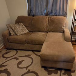 Ashley Furniture L-shaped couch with reversible chaise lounge