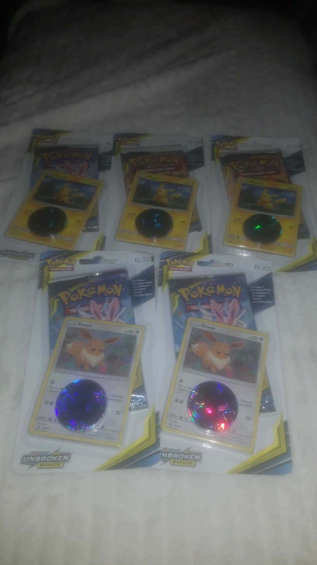 5 Pokemon packs with foils and coin