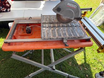 RIDGID-9-Amp-7-in-Blade-Corded-Wet-Tile-Saw-with-Stand-R4031S/31)Key FeaturesMotor: Powered by a 9-amp motor to cut through ceramic, porcelain,
