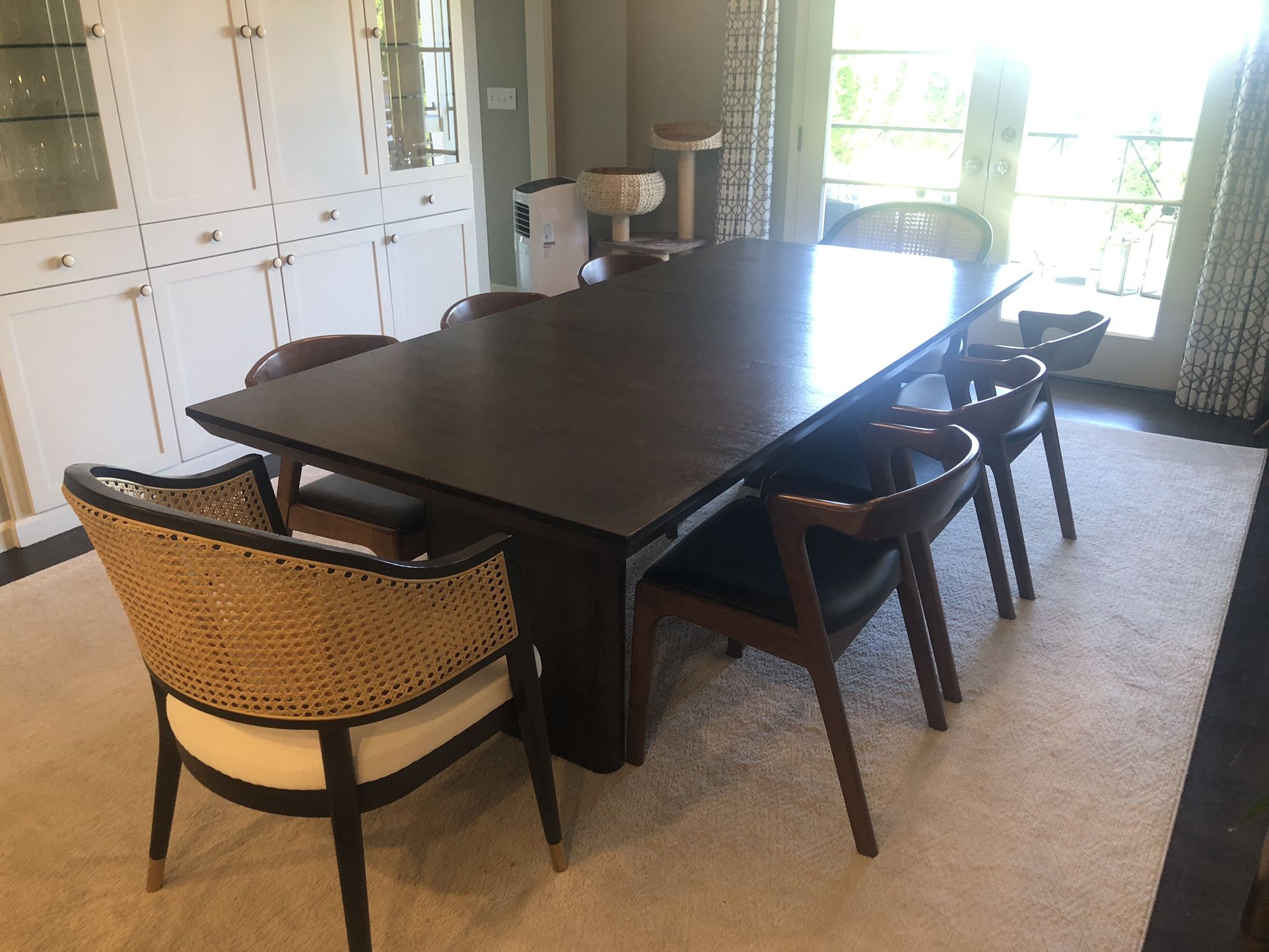 Dining Table, 8 Chairs And Cream Rug