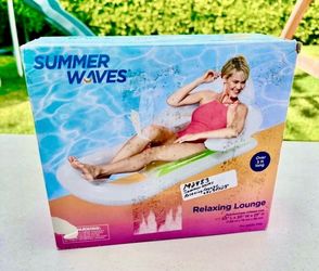 Summer Waves Relaxing Lounge New In Box Approximate inflated size: 63" Lx 30" W x 23"H