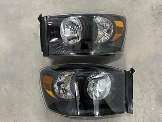 06-09 Dodge Ram Headlights Black Housing With Amber Corners/ Luces